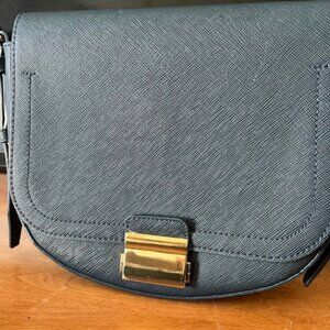 Love and Lore moon shaped shoulder bag.
